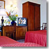 A triple room at Hotel des Artistes in Rome, Italy