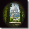 The dome of St. Peter's seen though the keyhole in teh gate of the Knights of Malta compound on the Aventine Hill of Rome