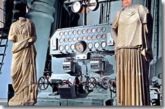 The ancient statues in Art Center Acea are posed against the industrial machinery of the Centrale Montamartini power plant.