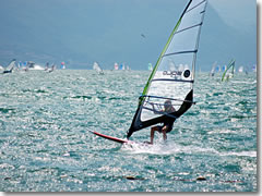 A windsurfer on Lake Garda near Riva del Garda and Torbole