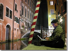 Catching a stray WiFi signal by a canal in Venice