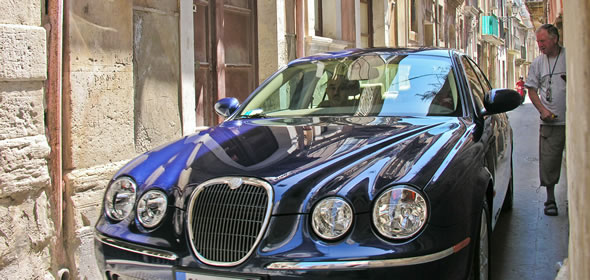 A car on the narrow streets of Ortigia, Siracusa