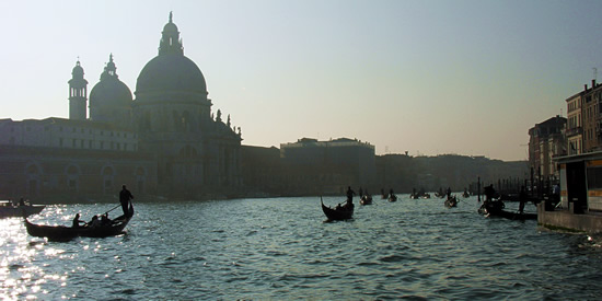 Gondolas ply the Grand Canal in Venice, Italy